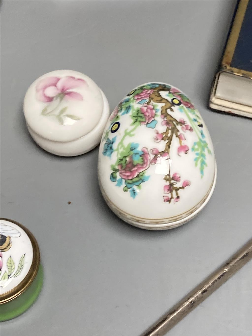 A group of small boxes and curios including a 19th century Dieppe carved ivory trinket box, 6cm.